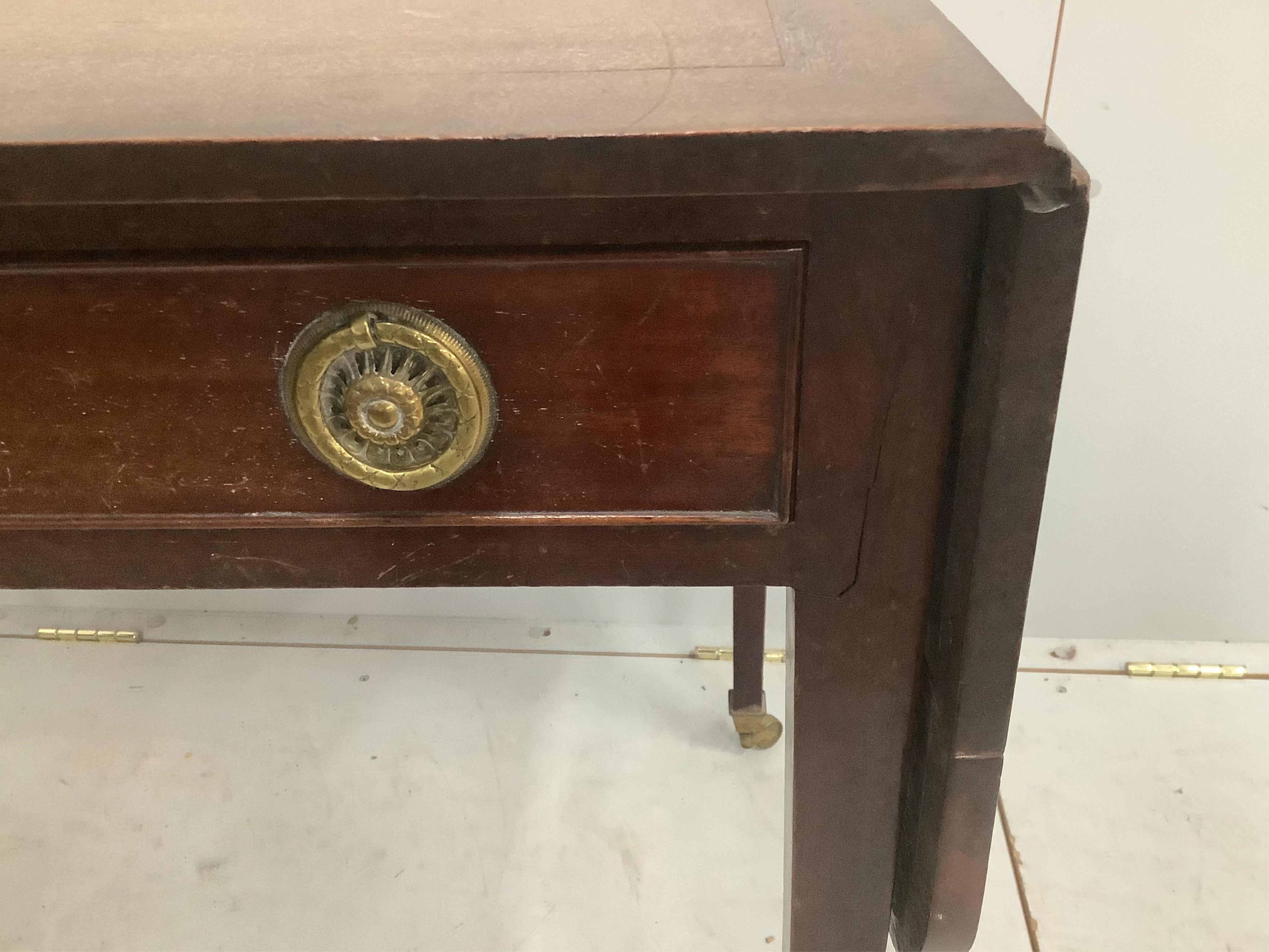 A George III mahogany drop leaf side table, width 92cm, depth 55cm, height 70cm. Condition -fair